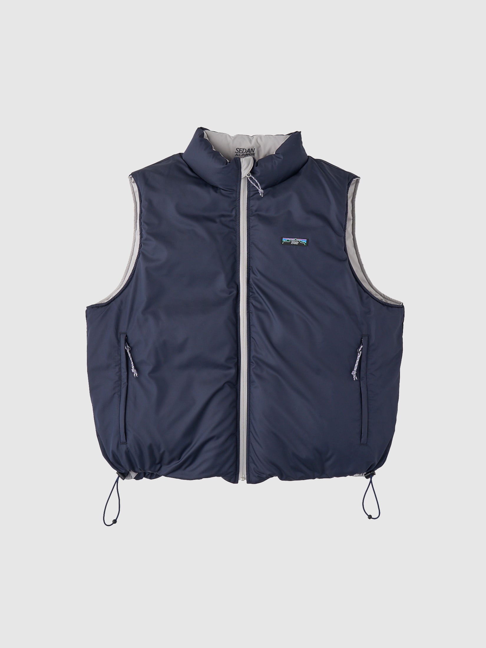 REVERSIBLE DOWN VEST｜STONE x NAVY